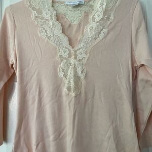Nice gently worn lace top. Great for layering. Size says large more like medium